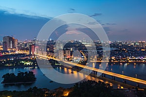 Aerial skyline view of Hanoi at Linh Dam lake, Belt Road No. 3. Hanoi cityscape by sunset period