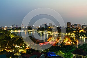 Aerial skyline view of Hoan Kiem lake or Ho Guom, Sword lake. Hoan Kiem is center of Hanoi city. Hanoi cityscape.
