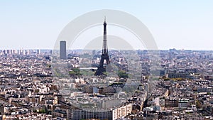 Aerial slide and pan footage of Eiffel Tower. Popular sight with highest observation deck in European Union. Buildings