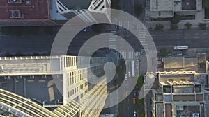 AERIAL: Slow Birds eye View flight over Downtown Los Angeles California in beautiful Sunrise Light with view of