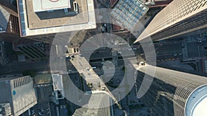 AERIAL: Slow uplifting birds eye View flight over Downtown Los Angeles California Grand Avenue in beautiful Sunrise