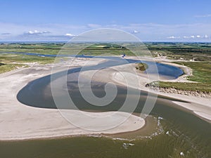 Aerial of the slufter national park with water inlet in the dunes of dutch island Texel