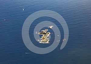 Aerial of small island Fred bliss rocks in the inner outer Guts