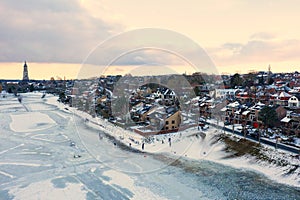 Aerial from the snowy city Rhenen in the Netherlands in winter