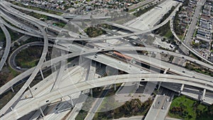 AERIAL: Spectacular Judge Pregerson Highway showing multiple Roads, Bridges, Viaducts with little car traffic in Los