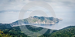 Aerial spring view of Asos peninsula and town. Misty morning seascape of Ionian Sea. Majestic outdoor scene of Kephalonia island,