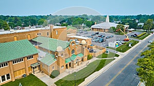 Aerial St Jude Catholic school and church with school windows under construction