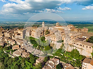 Aerial summer day view of Montepulciano town, located on top of a limestone ridge surrounded by vineyards. Vino Nobile wine