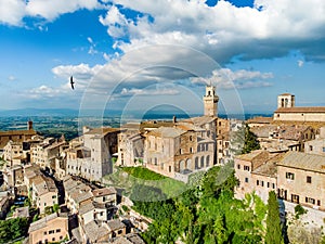 Aerial summer day view of Montepulciano town, located on top of a limestone ridge surrounded by vineyards. Vino Nobile wine