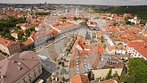 AERIAL. Sunny shot above Town Hall Square of Vilnius old