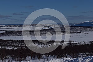 Aerial sunny winter view of Kiruna and Kirunavaara, Lapland, Norrbotten County, Sweden,