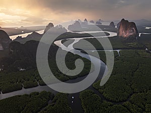 Aerial sunrise view of mangrove forest and mountain peak of Phang nga bay - Thailand