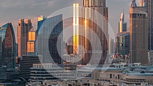 Aerial sunset cityscape with architecture of Dubai downtown timelapse, United Arab Emirates.