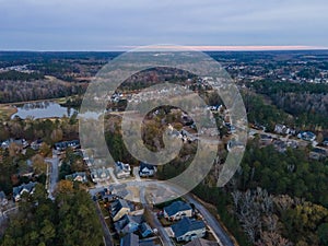 Aerial sunset landscape of forest and suburban neighborhood in Evans Augusta Georgia