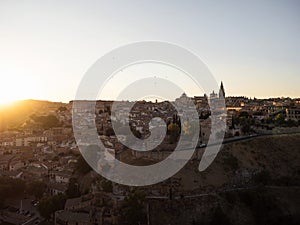 Aerial sunset panorama of historic medieval Toledo cityscape skyline at Tagus river in Castilla La Mancha Spain Europe