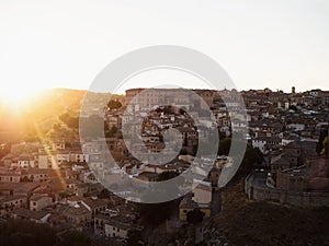 Aerial sunset panorama of historic medieval Toledo cityscape skyline at Tagus river in Castilla La Mancha Spain Europe