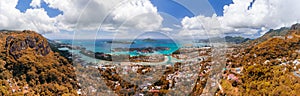 Aerial sunset panoramic view of Mahe coastline and Eden Island, Seychelles