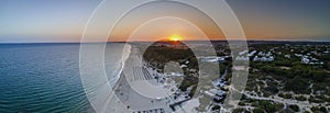 Aerial sunset seascape of famous Altura beach, Algarve