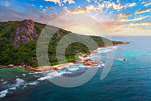 Aerial sunset view of Anse Source D'argent beach at La Digue Island, Seychelles