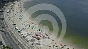 Aerial sweeping footage of Copacabana beach in Rio de Janeiro
