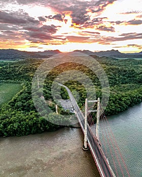 Aerial of the Taiwan Friendship bridge, Puente La Amistad de Taiwan at sunset photo