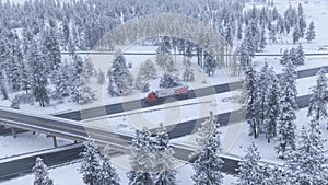 AERIAL: Target truck hauls a container full of clothes along slippery highway.