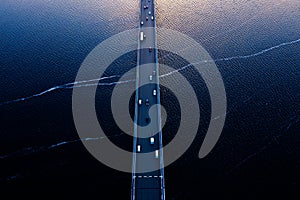 Aerial of Tasman bridge over wide flowing Derwent river in Tasmania Australia at sunset