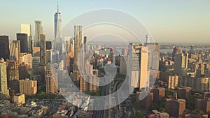 AERIAL: Tilt up to Reveal Manhattan New York City Skyline at Sunset in beautiful