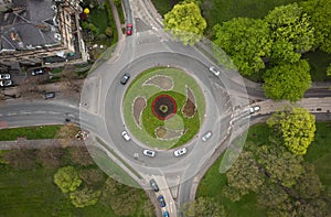 Aerial timelapse of busy traffic roundabout