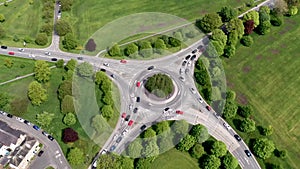 Aerial timelapse of busy traffic roundabout