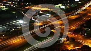 Aerial timelapse, San Antonio, Texas intersection at night 4K