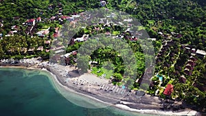 Aerial top down drone footage of the famous Finns beach club that lies on the famous Echo beach in Bali, Indonesia
