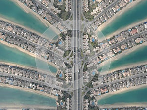 Aerial top down panoramic shot of the famous Palm Jumeirah artificial archipelago in Dubai, UAE