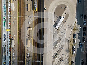 Aerial top down picture of railway station transportation hub showing the different trains parked next to each other on