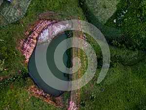 Aerial top down of pond at Chapada dos GuimarÃÂ£es National Park in Mato Grosso photo