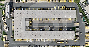 Aerial top down of a postal forwarding shipment center. Sorting center, distribution and transshipment.