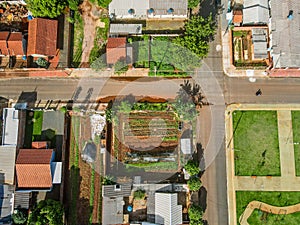 Aerial top down of roofs and rural roads in Tangara da Serra in Mato Grosso