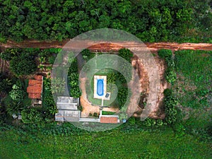 Aerial top down of tropical pool during summer in city of Tangara da Serra in Mato Grosso