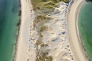 Aerial top down view on amazing Dog`s bay beach near Roundstone town in county Galway, Sandy dunes and beach and blue turquoise