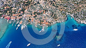 Aerial top down view of Ancient village of Simena beach and yachts,