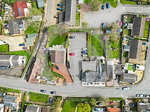 Aerial top down view of the centre of a typical English village.