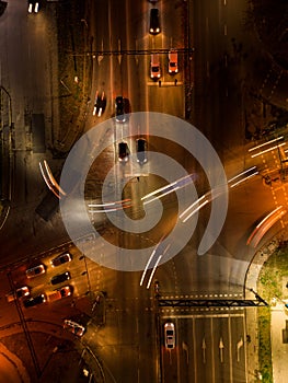 Aerial top down view of crossroads at night