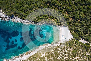 Aerial top down view of Dafnoudi beach in Kefalonia, Greece. Remote bay with pure crystal clean turquoise sea water