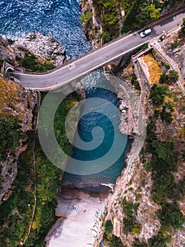 Aerial top down view of Fiordo di furore beach. Incredible beauty panorama. The rocky seashore of southern Italy. Sunny summer day