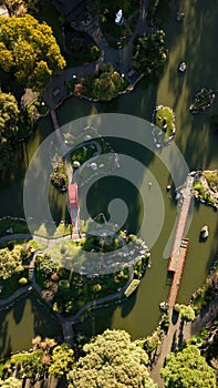 An aerial top-down view on Japanese styled garden with oriental architecture