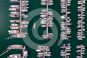 Aerial top down view of many leisure boats and yachts moored in marina in Cascais, Portugal