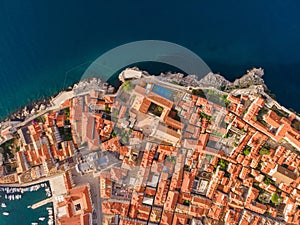 Aerial top down view of old town of Dubrovnik, Dalmatia, Croatia. Medieval city fortress on the coast of Adriatic sea