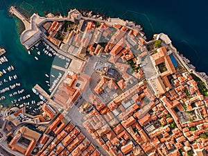 Aerial top down view of old town of Dubrovnik, Dalmatia, Croatia. Medieval city fortress on the coast of Adriatic sea