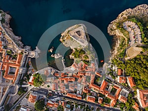 Aerial top down view of old town of Dubrovnik with Lovrijenac fortress, Dalmatia, Croatia. Medieval city on the coast of