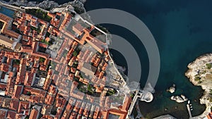 Aerial top down view of old town of Dubrovnik with Lovrijenac fortress, Dalmatia, Croatia. Medieval city on the coast of
